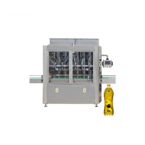 Chai dầu nhỏ đóng nắp và máy dán nhãn